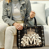 Catholight  The Divine Monogram Leather Bag